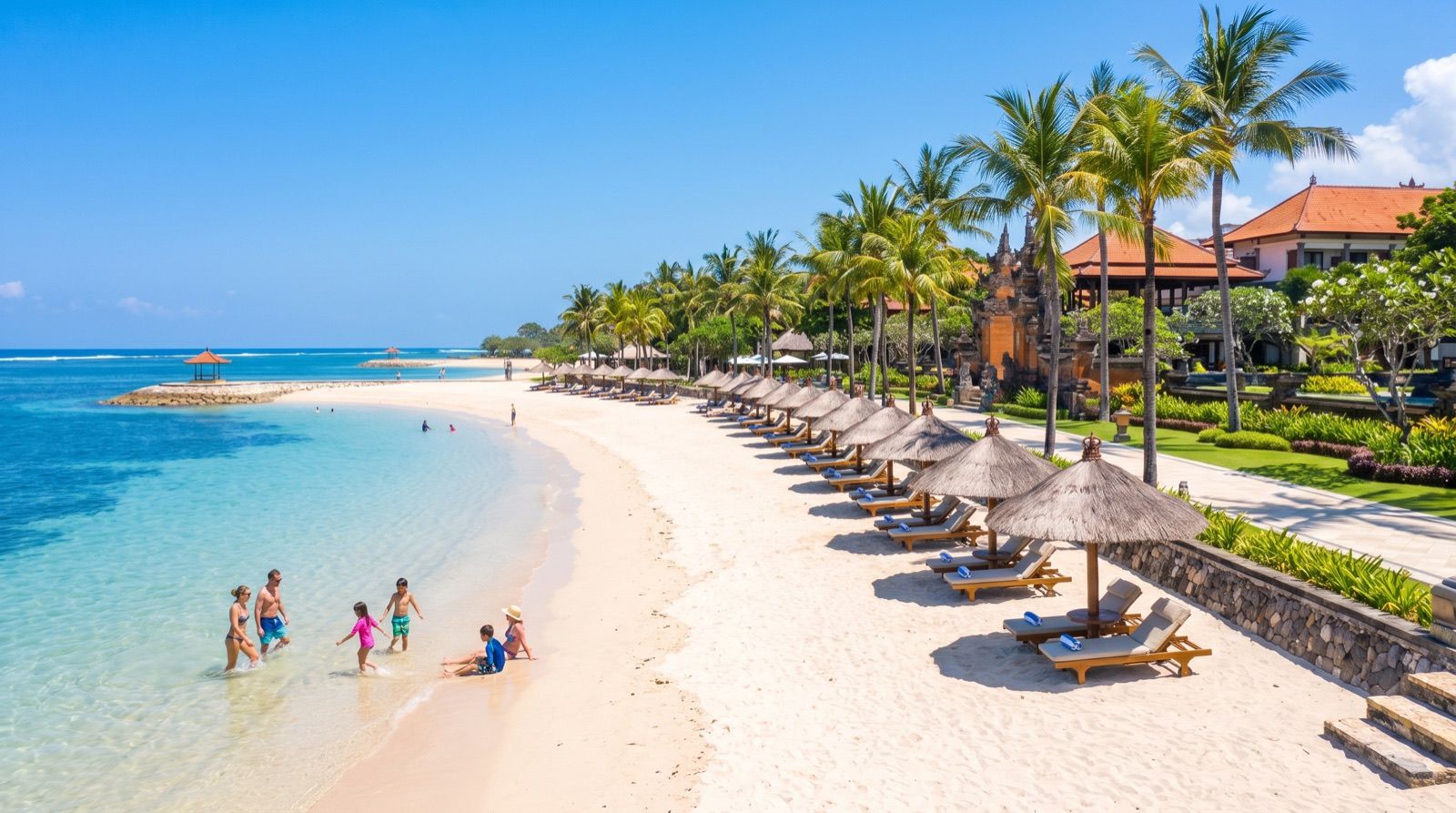 Calm white-sand resort beach with turquoise water at Nusa Dua, Bali